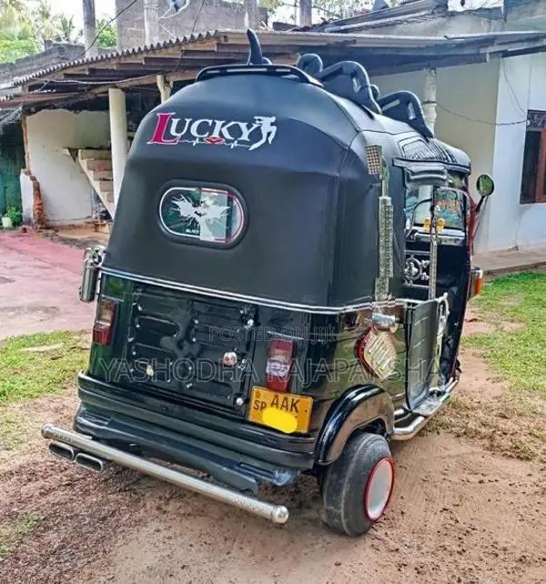 Bajaj RE 2013