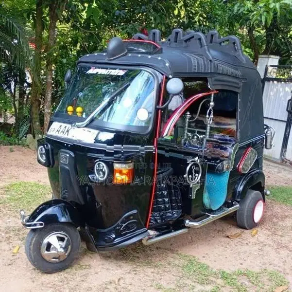Bajaj RE 2013