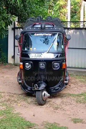 Bajaj RE 2013