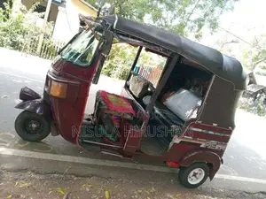 Bajaj RE 2011