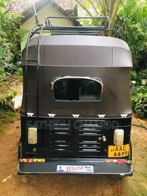 Bajaj RE 2013