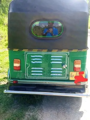 Bajaj RE 2013