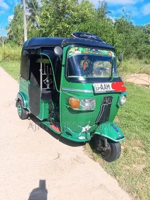 Bajaj RE 2013