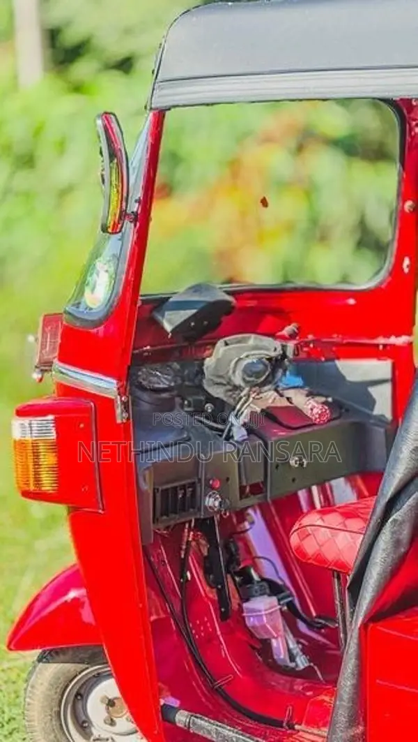 Bajaj RE 2013