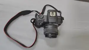 Canon EOS R100 DSLR Camera