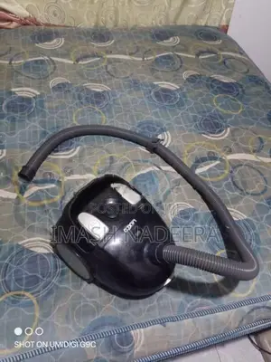 Corded Canister ( Bagged ) Vacuum Cleaner