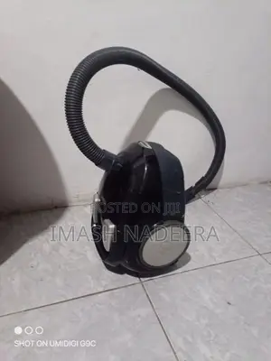 Corded Canister ( Bagged ) Vacuum Cleaner