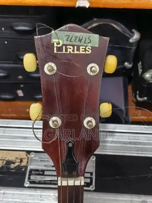 PIRLES Banjo-Guitar