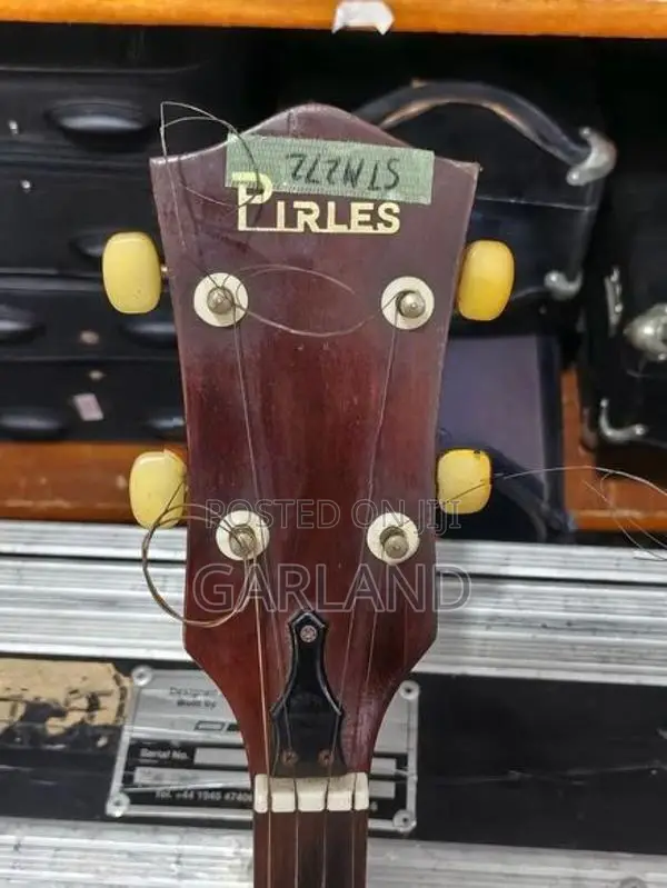 PIRLES Banjo-Guitar