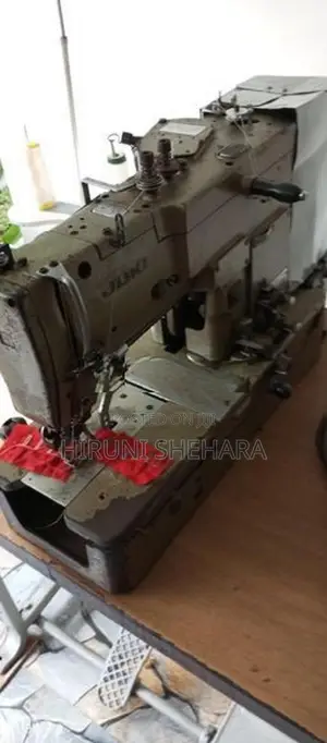 Juki Button Hold Machine