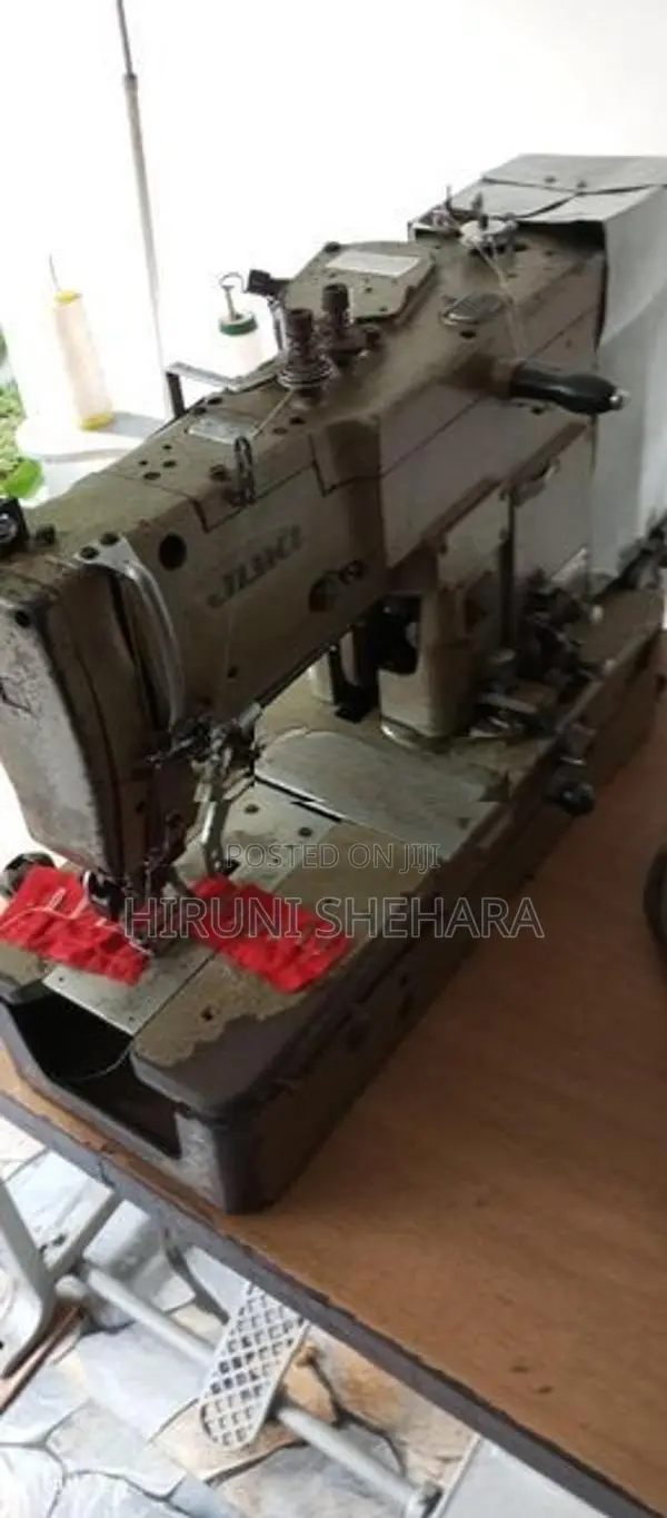 Juki Button Hold Machine