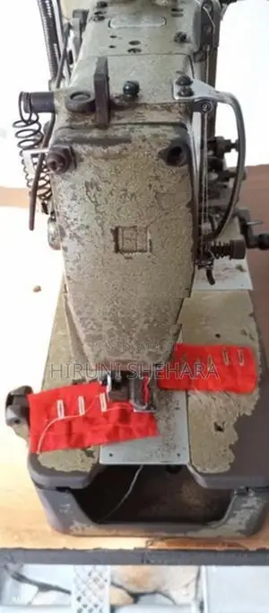Juki Button Hold Machine