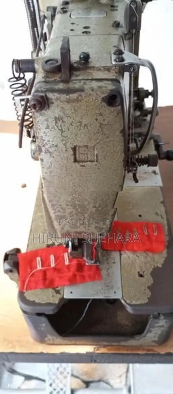 Juki Button Hold Machine