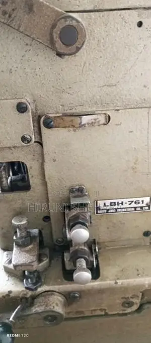 Juki Button Hold Machine