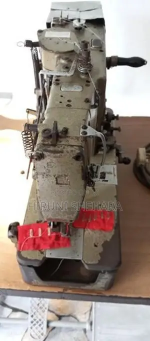 Juki Button Hold Machine