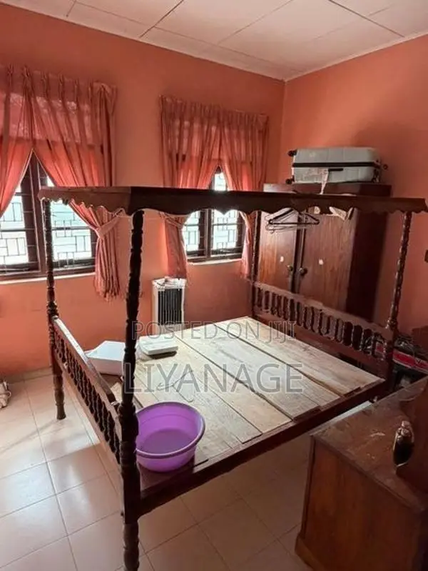 Traditional Wooden Four-Poster Bed