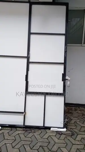 Iron Frame With Attached Board Door