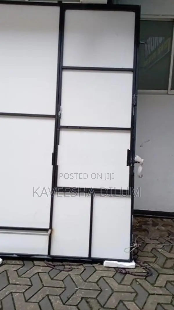 Iron Frame With Attached Board Door