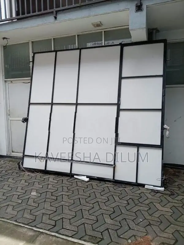 Iron Frame With Attached Board Door