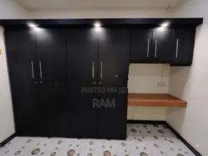 Two Large Built-In Wardrobes