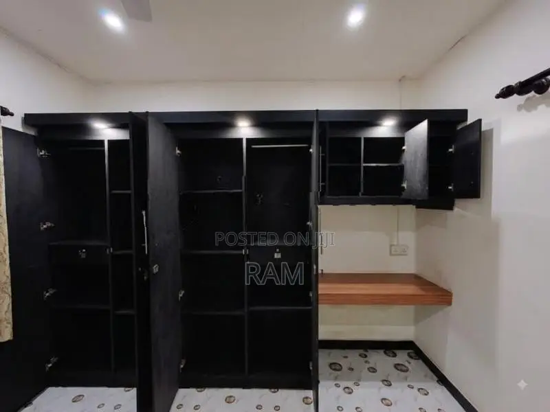 Two Large Built-In Wardrobes