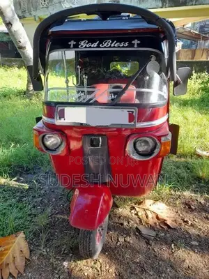 Bajaj RE 2011