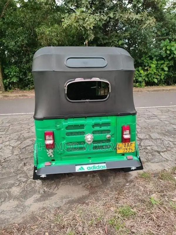 Bajaj RE 2014
