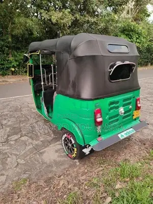 Bajaj RE 2014