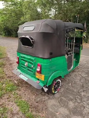 Bajaj RE 2014