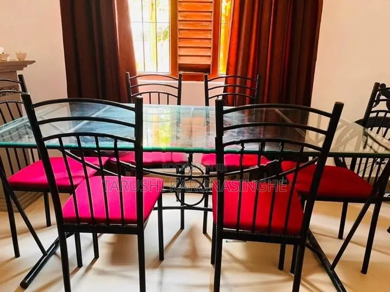 Tempered Glass Dining Table With Chairs
