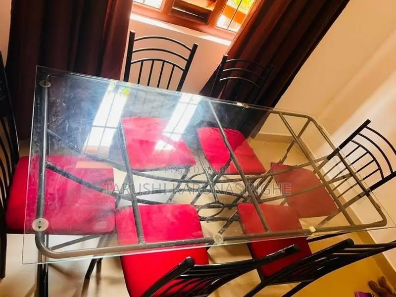 Tempered Glass Dining Table With Chairs