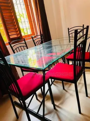 Tempered Glass Dining Table With Chairs