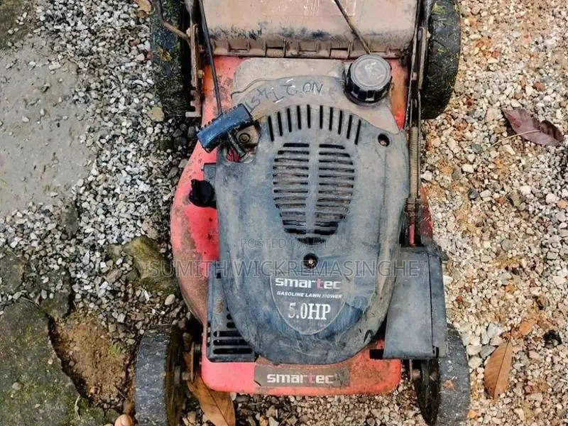 Two Petrol Lawn Mowers