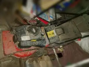 Two Petrol Lawn Mowers