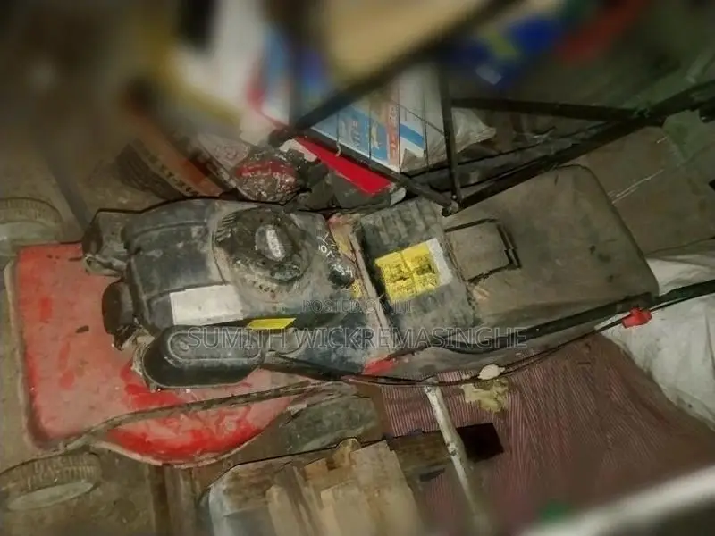 Two Petrol Lawn Mowers