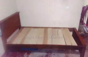 Brown Wooden Bed