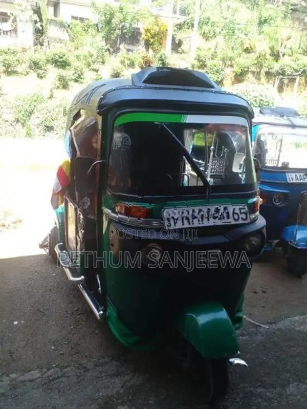 Bajaj RE 2014