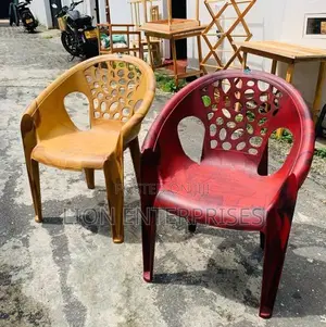 Nippon plastic arm chairs maroon and brown