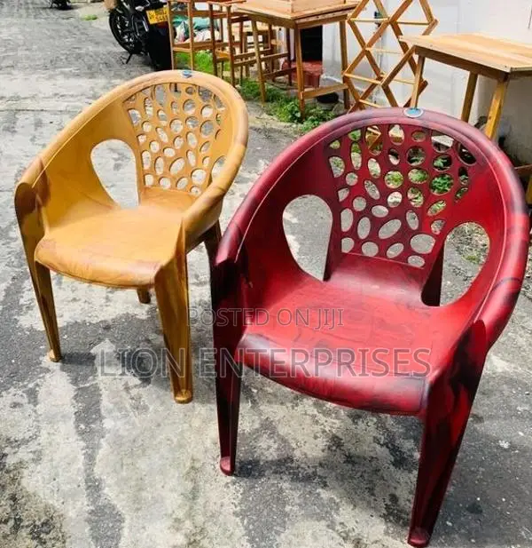 Nippon plastic arm chairs maroon and brown