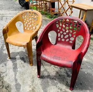Nippon plastic arm chairs maroon and brown