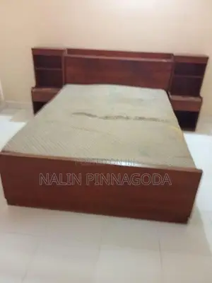don_corolis Double Bed With Side Cupboards