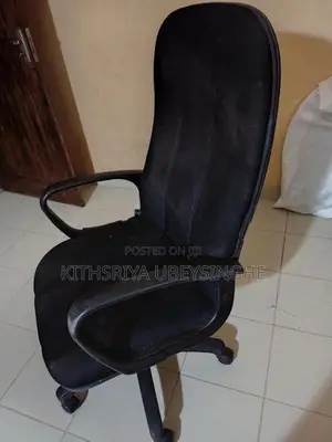 Used Rotating Arm Chair