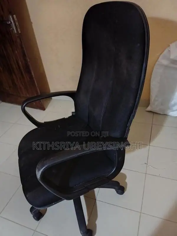 Used Rotating Arm Chair