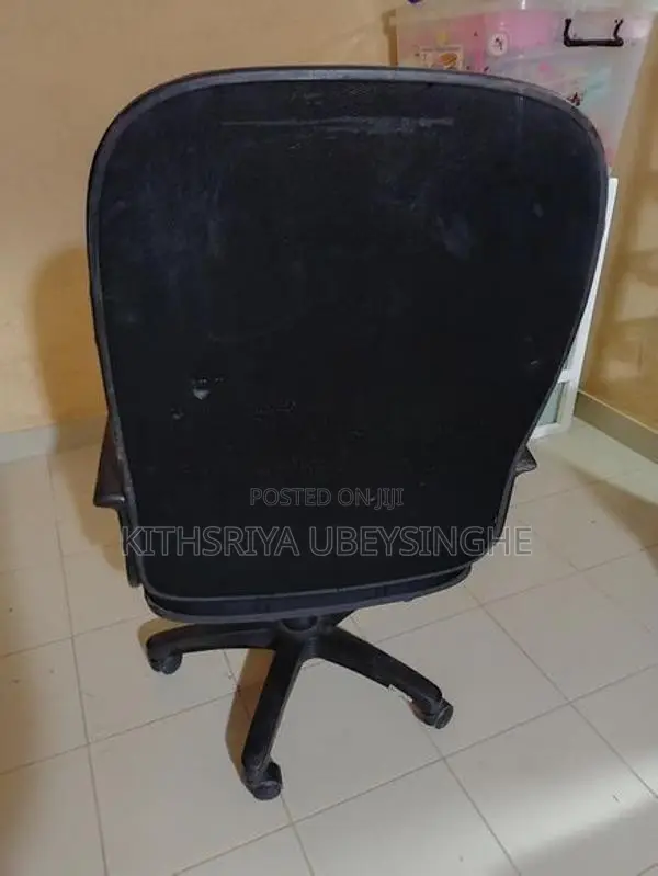 Used Rotating Arm Chair