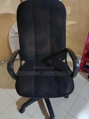 Used Rotating Arm Chair
