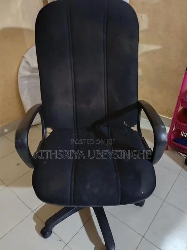 Used Rotating Arm Chair