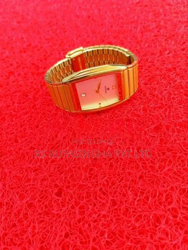 Titan Gold Color Hand Watch