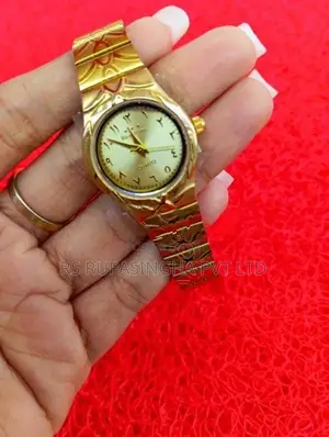 Quartz Gold Color Hand Watch