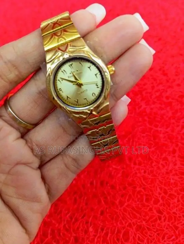 Quartz Gold Color Hand Watch