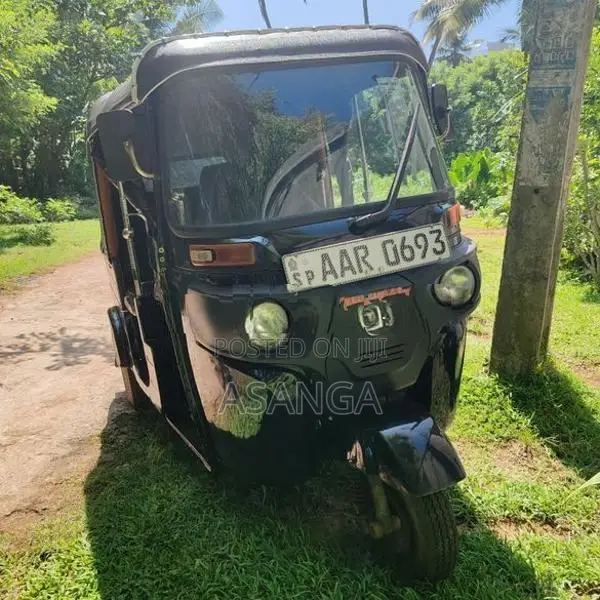 Bajaj RE 2014